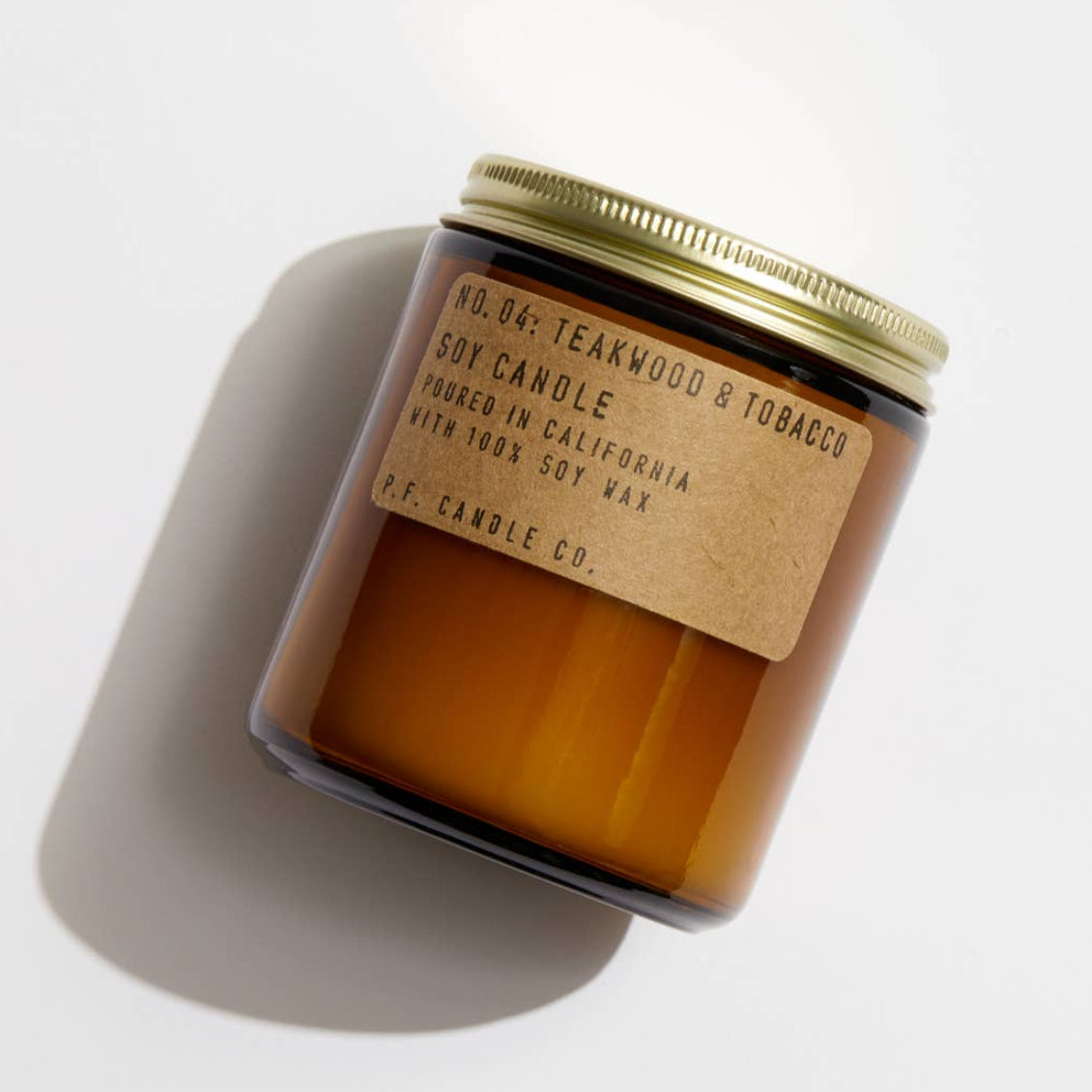 Jar candle with a label on a light background