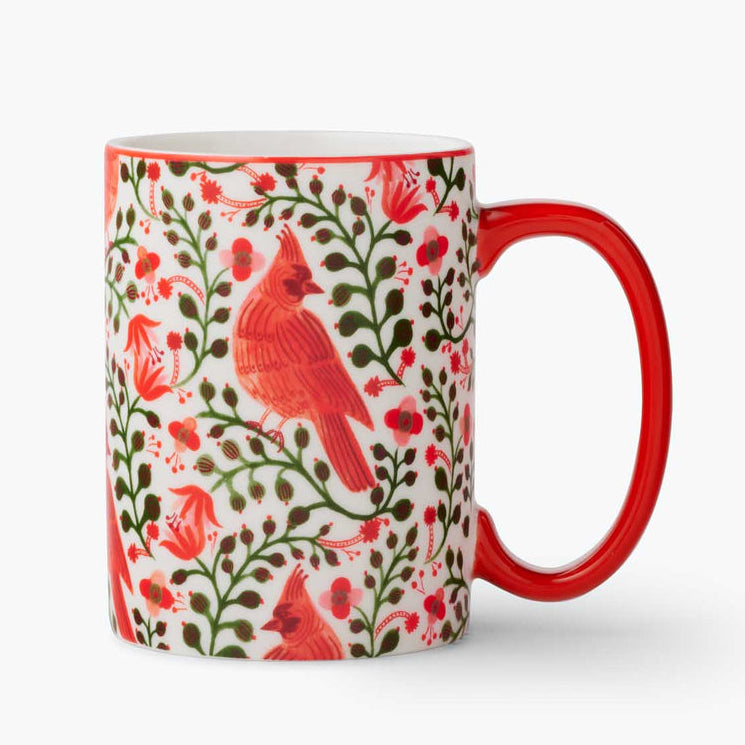 Mug with red cardinal and floral pattern on a white background